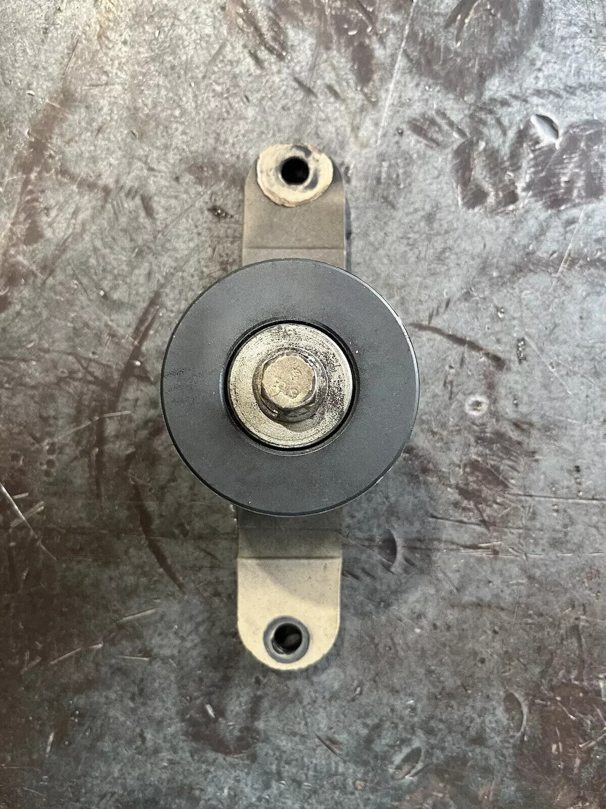 John Deere Idler Pulley RE540557 With Support Bracket